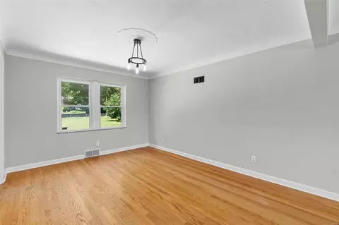 Living - 231 Wooster Dr, Ferguson, MO 63135 photo 6 of 10