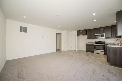 Living - 60 Mora Blvd #428-402, O'fallon, MO 63368 photo 3 of 5