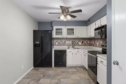 Kitchen - 7421 Triwoods Dr #E, Saint Louis, MO 63119 photo 2 of 4