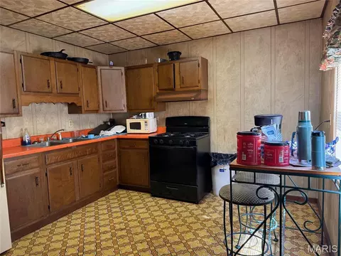 Kitchen - 300 E 2nd St, Pana, IL 62557 photo 3 of 4