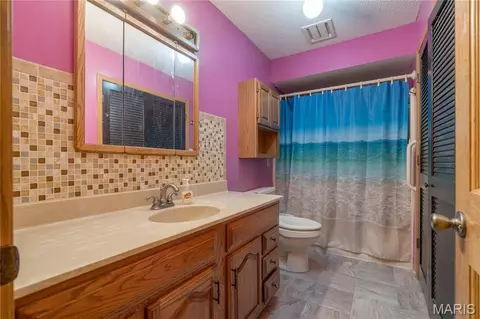 Bath - 136 Donna Dr, Hartford, IL 62048 photo 1 of 2