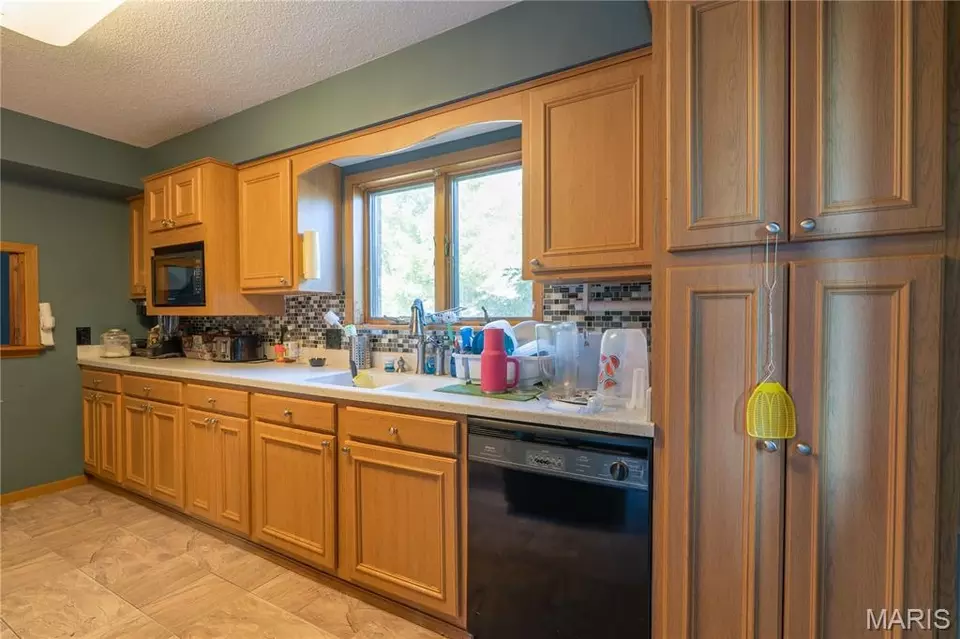 Kitchen - 136 Donna Dr, Hartford, IL 62048 photo 3 of 4