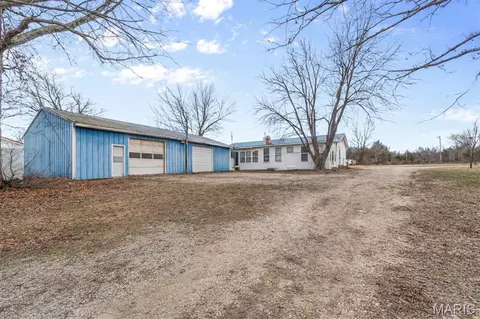 Exterior - 64 Mocking Bird Ln, Hawk Point, MO 63349 photo 6 of 12