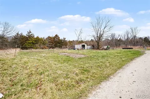 Exterior - 64 Mocking Bird Ln, Hawk Point, MO 63349 photo 7 of 12
