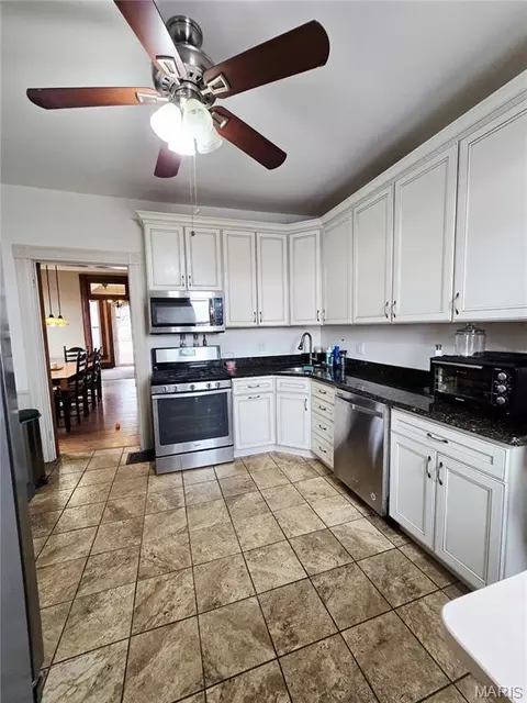 Kitchen - 437 E 4th St, Alton, IL 62002 photo 1 of 2