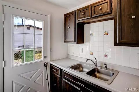 Kitchen - 1124 Saint Michael Dr, Cahokia, IL 62206 photo 2 of 2