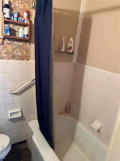 Bath - 101 E 1st North St, Mount Olive, IL 62069 photo 2 of 3