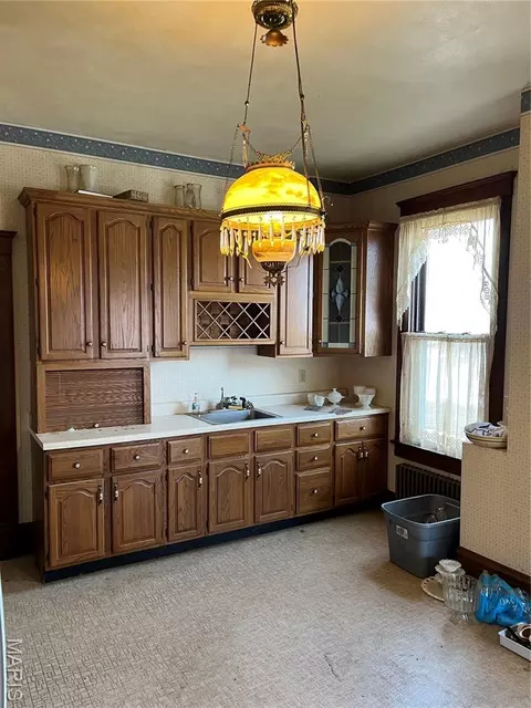 Kitchen - 101 E 1st North St, Mount Olive, IL 62069 photo 3 of 4