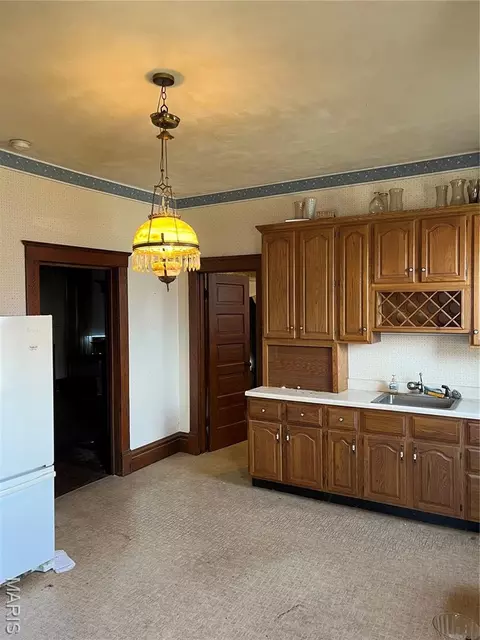 Kitchen - 101 E 1st North St, Mount Olive, IL 62069 photo 1 of 4