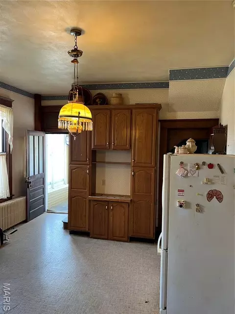 Kitchen - 101 E 1st North St, Mount Olive, IL 62069 photo 2 of 4