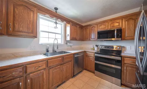 Kitchen - 13458 Toffee Ln, Saint Robert, MO 65584 photo 1 of 2