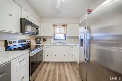 Kitchen - 402 Locust St, Cuba, MO 65453 photo 2 of 3