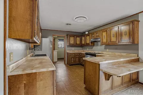 Kitchen - 104 S Everett St, Kennett, MO 63857 photo 2 of 4