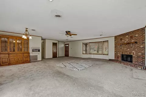 Living - 104 S Everett St, Kennett, MO 63857 photo 1 of 10