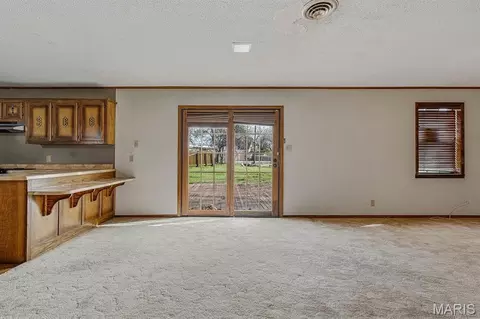 Living - 104 S Everett St, Kennett, MO 63857 photo 9 of 10