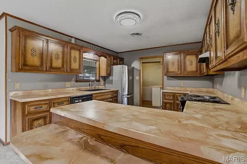 Kitchen - 104 S Everett St, Kennett, MO 63857 photo 1 of 4