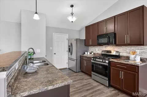 Kitchen - 207 Bluestem Ln, O'fallon, MO 63366 photo 2 of 3