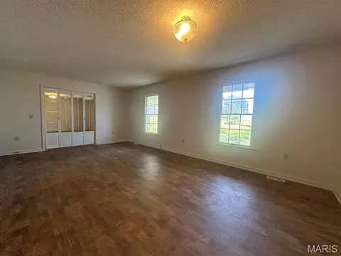 Living - 17173 E Cedar Hills Dr, Dexter, MO 63841 photo 1 of 3