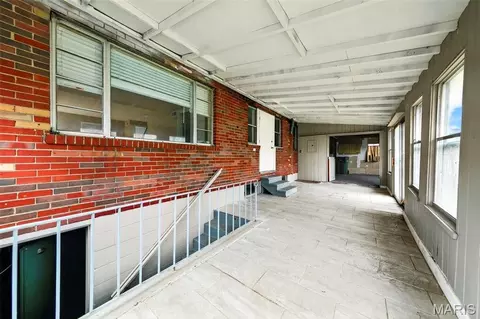 Exterior - 7245 Saint Andrews Pl, Normandy, MO 63121 photo 4 of 8