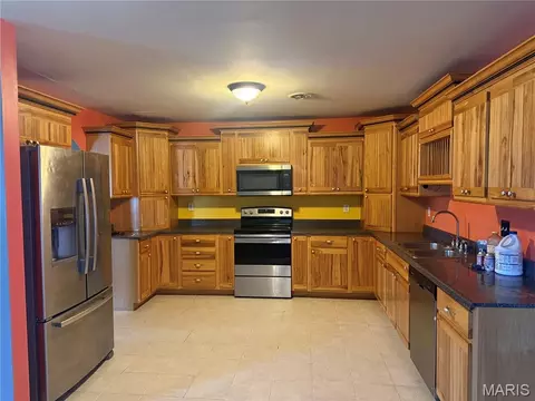 Kitchen - 1105 Peach St, Kennett, MO 63857 photo 1 of 2