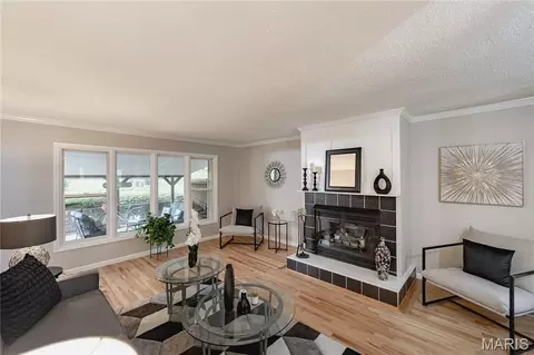 Living - 415 Montbrook Dr, O'fallon, MO 63366 photo 1 of 7