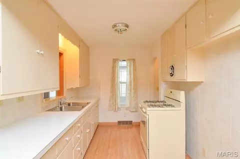 Kitchen - 109 E Jefferson St, O'fallon, IL 62269 photo 2 of 3