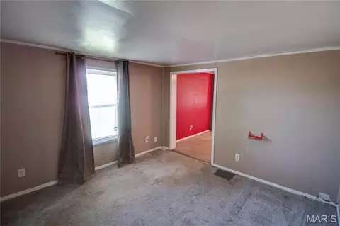 Living - 124 E 7th St, Roxana, IL 62084 photo 2 of 2