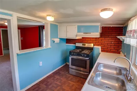 Kitchen - 124 E 7th St, Roxana, IL 62084 photo 3 of 3