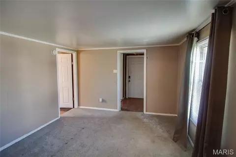 Living - 124 E 7th St, Roxana, IL 62084 photo 1 of 2