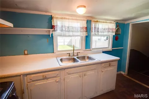 Kitchen - 124 E 7th St, Roxana, IL 62084 photo 2 of 3
