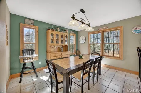 Dining - 18521 Oak Tree Ln, Phillipsburg, MO 65722 photo 2 of 2