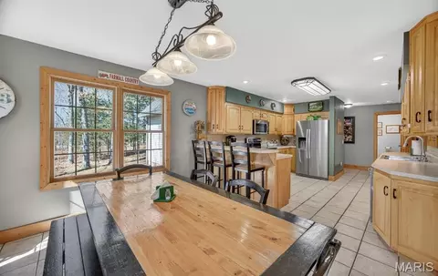 Dining - 18521 Oak Tree Ln, Phillipsburg, MO 65722 photo 1 of 2