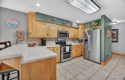 Kitchen - 18521 Oak Tree Ln, Phillipsburg, MO 65722 photo 3 of 3