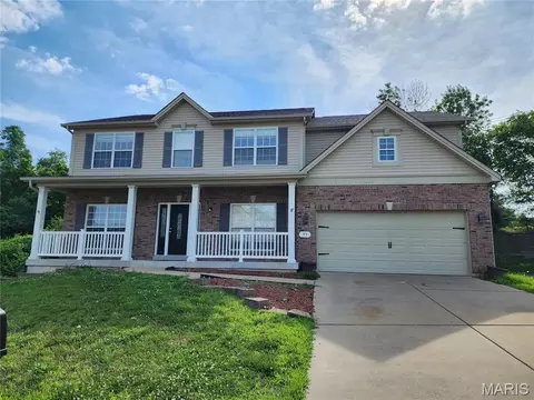 59 Charbonier Bluffs Dr, Florissant, MO 63031