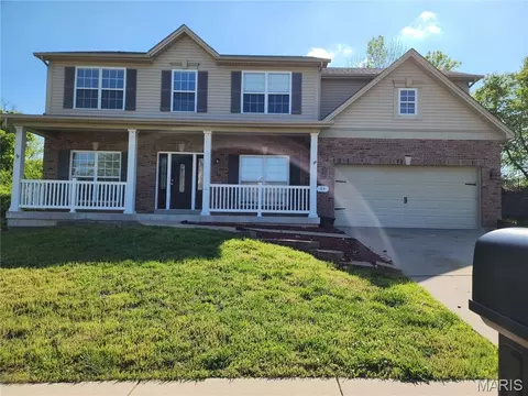 59 Charbonier Bluffs Dr, Florissant, MO 63031