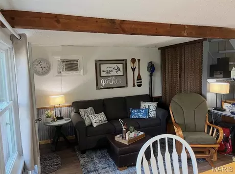 Living - 1142 Cedar Ridge Cir, Roach, MO 65787 photo 1 of 3