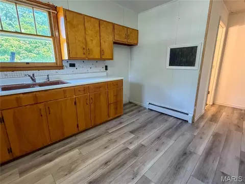 Kitchen - 311 E 1st North St, Mount Olive, IL 62069 photo 2 of 2