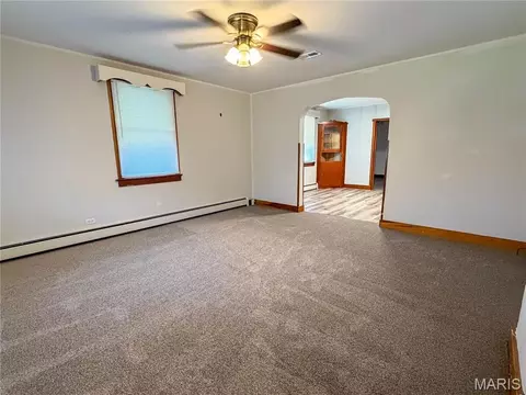 Living - 311 E 1st North St, Mount Olive, IL 62069 photo 2 of 3