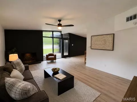 Living - 8408 Buckthorn Dr, Berkeley, MO 63134 photo 4 of 11