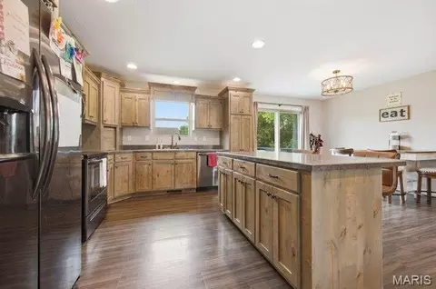 Kitchen - 105 Mars St, Holts Summit, MO 65043 photo 1 of 2