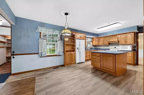 Kitchen - 908 Devonshire Ln, Saint Charles, MO 63301 photo 3 of 5