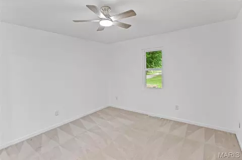 Bedroom - 411 E Roosevelt Dr, Moro, IL 62067 photo 1 of 12