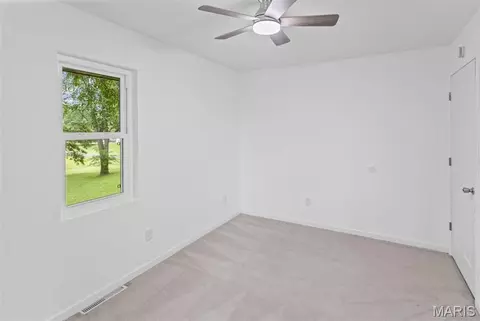 Bedroom - 411 E Roosevelt Dr, Moro, IL 62067 photo 6 of 12
