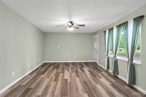 Living - 411 E Roosevelt Dr, Moro, IL 62067 photo 1 of 4
