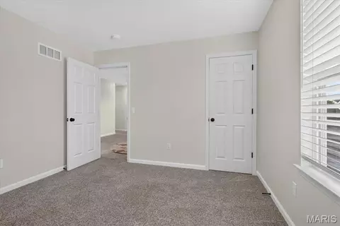 Bedroom - 2137 Henley Woods Dr, Arnold, MO 63010 photo 2 of 10