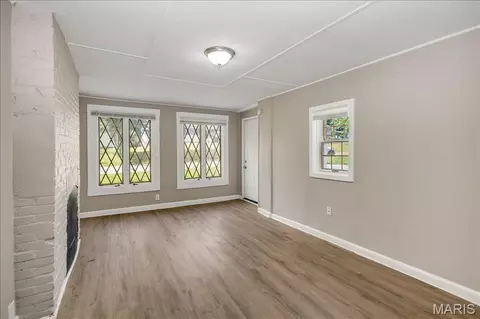 Living - 7461 Castro Dr, Ferguson, MO 63135 photo 5 of 7