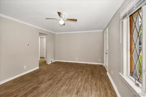 Living - 7461 Castro Dr, Ferguson, MO 63135 photo 4 of 7
