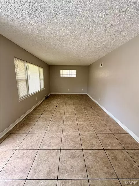 Living - 9010 Trefore Ave, Berkeley, MO 63134 photo 1 of 7