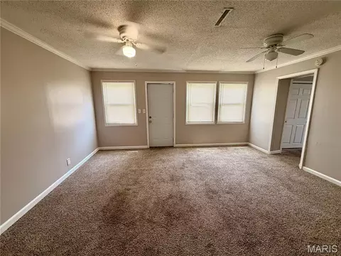 Living - 9010 Trefore Ave, Berkeley, MO 63134 photo 4 of 7