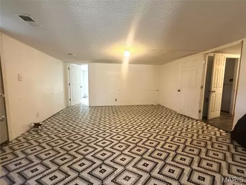 Living - 1018 N Baldwin St, Kennett, MO 63857 photo 1 of 3